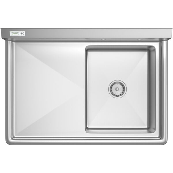 A Regency stainless steel commercial sink with a left drain and drainboard.
