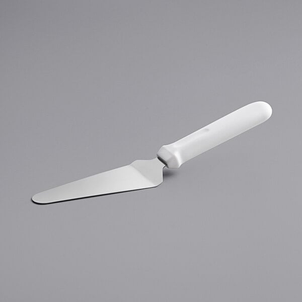 A white pie server with a white handle.