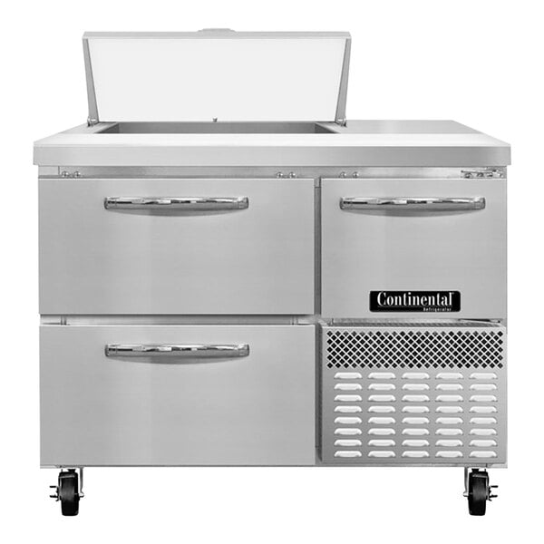 A large silver Continental Refrigerator with two drawers.