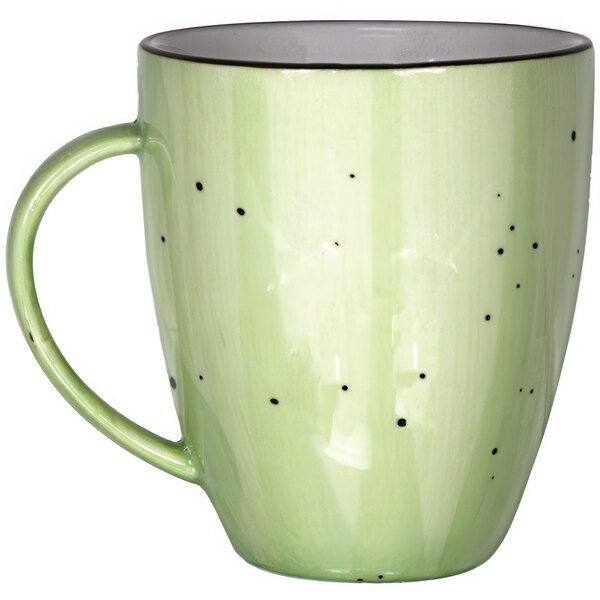 A close-up of an International Tableware lime tall porcelain cup with black dots.