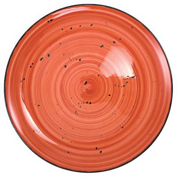 An International Tableware Ruby Coupe porcelain plate with black specks.