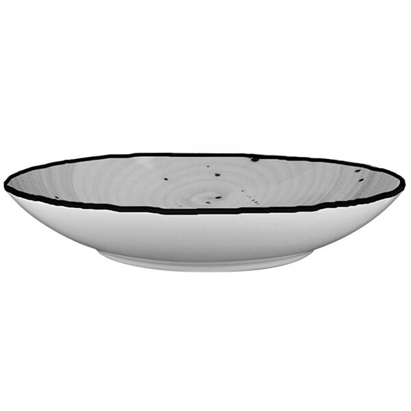 An International Tableware Rotana porcelain pasta bowl with a black rim.