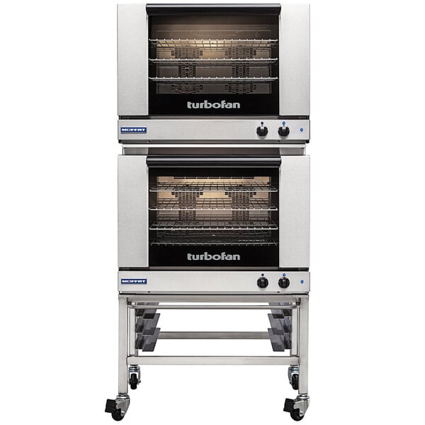 A Moffat Turbofan Double Deck Electric Convection Oven on wheels with shelves.