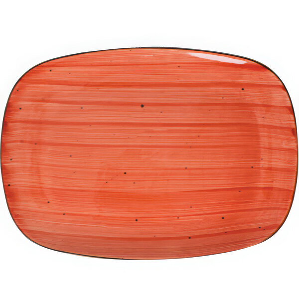 A red rectangular porcelain platter with black dots.