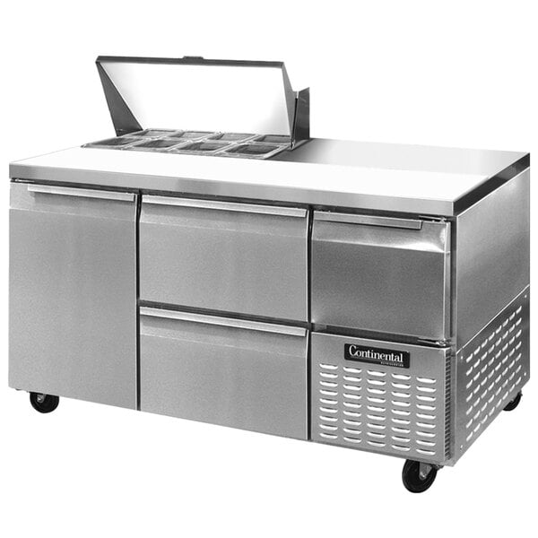 A stainless steel Continental Refrigerator with 2 drawers and 1 half door.