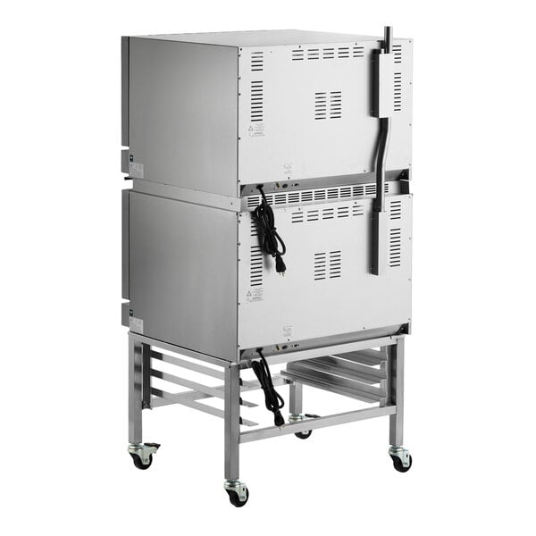 A double deck full size electric convection oven with mechanical controls and casters.