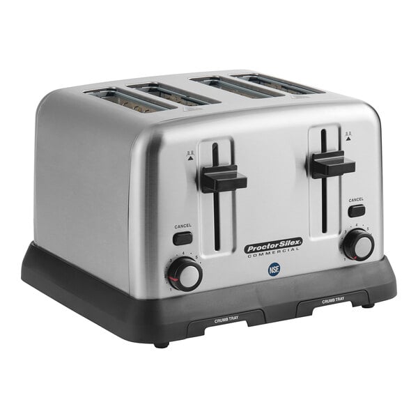 A Proctor Silex commercial toaster with four slices of bread in it.