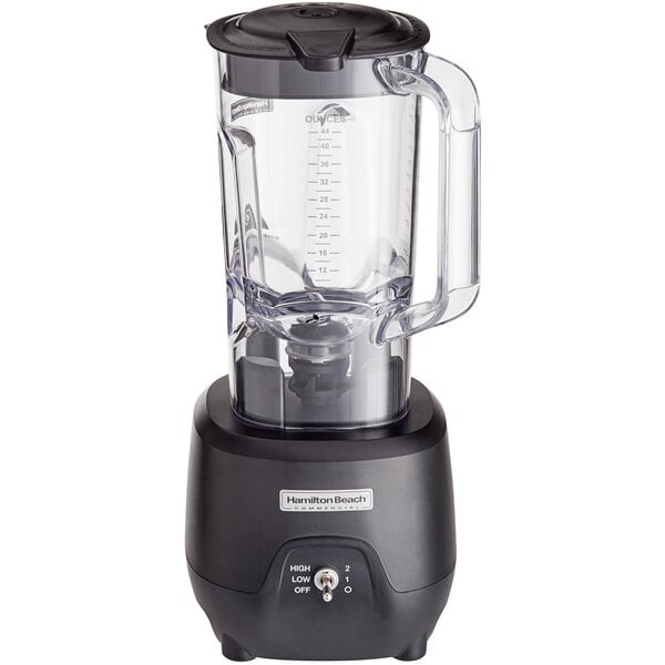 A Hamilton Beach commercial bar blender with a black and clear lid.