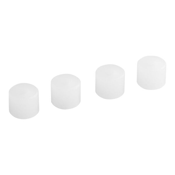 A row of white cylindrical caps.