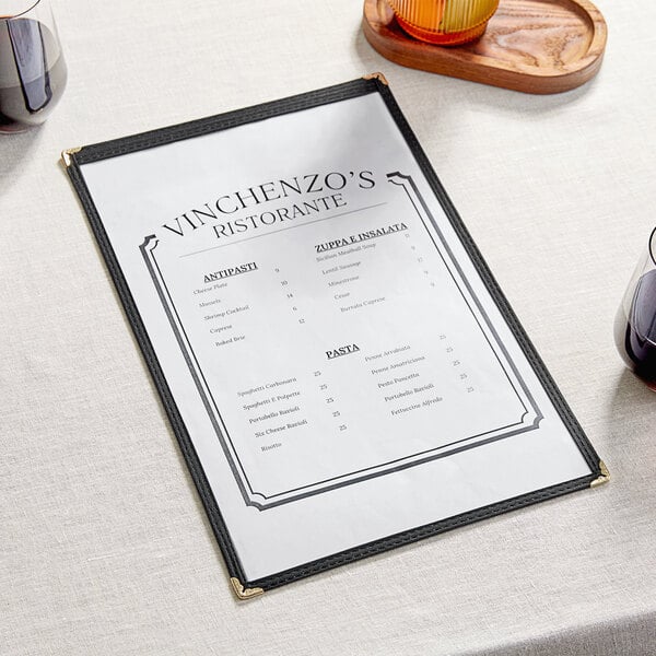 A black Choice menu cover on a table with a menu inside.