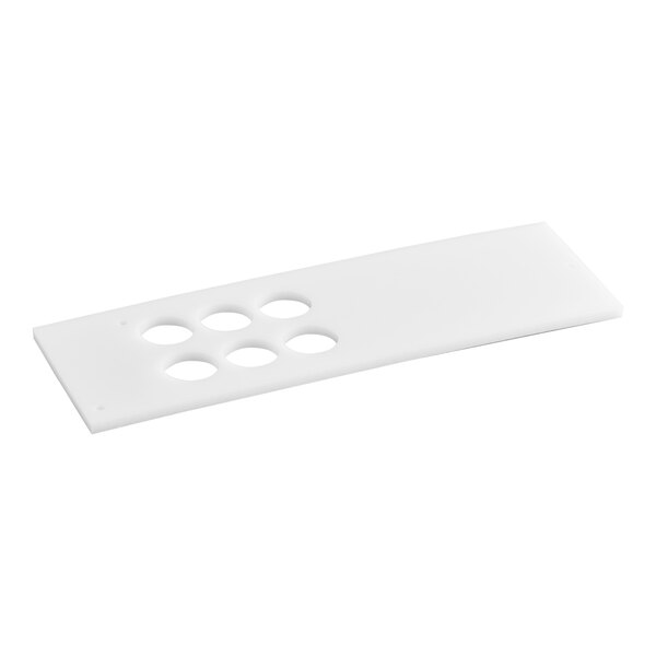 A white plastic tray with holes.