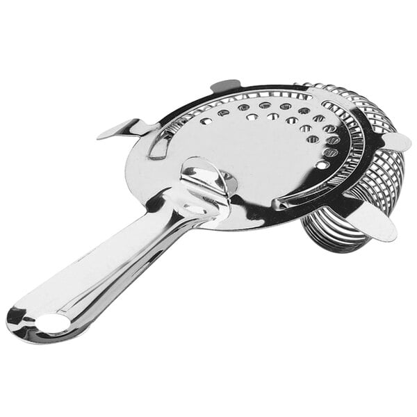 A stainless steel Vollrath cocktail strainer with a handle.