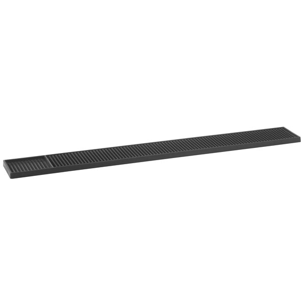 A black rectangular Vollrath bar mat with holes.