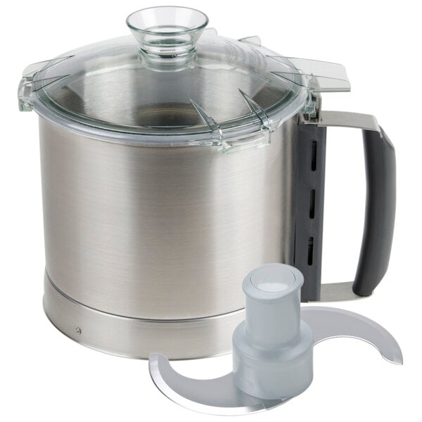 A stainless steel bowl with a lid and black and silver food processor parts.