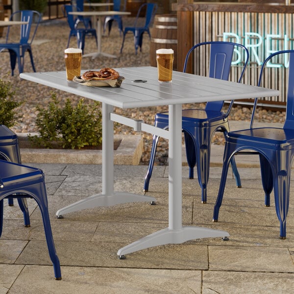Lancaster Table & Seating 32" x 48" Silver Powder-Coated Aluminum Dining Height Outdoor Table with Umbrella Hole