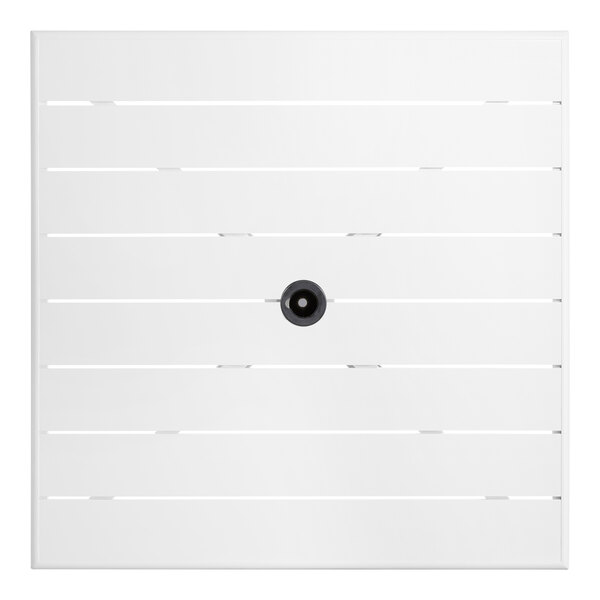 A white square Lancaster Table & Seating outdoor table with a black circle in the center.