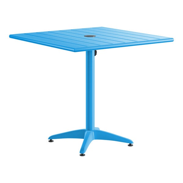 A blue powder-coated aluminum outdoor dining table with a square top and an umbrella hole in the center.