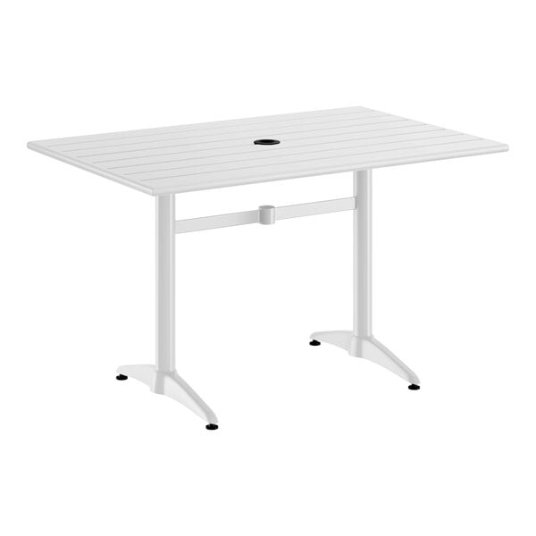 A rectangular white powder-coated aluminum outdoor dining table with an umbrella hole in the center.