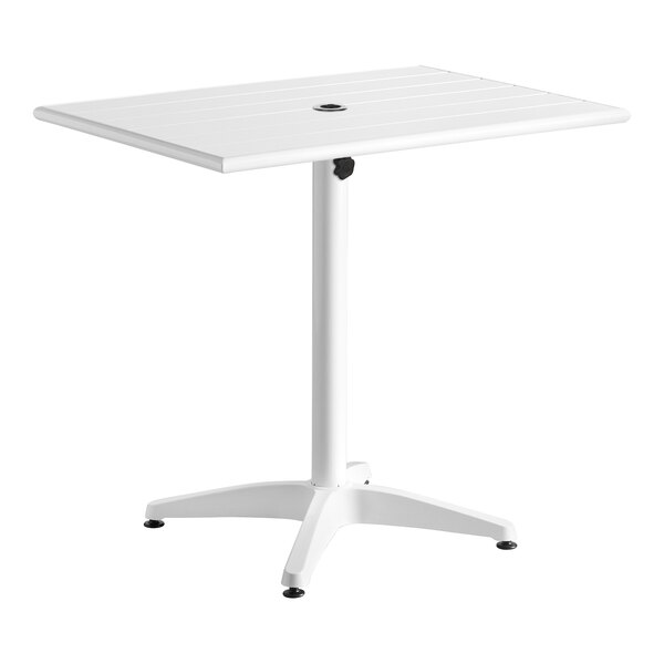 A white table with a white aluminum base and a rectangular top.