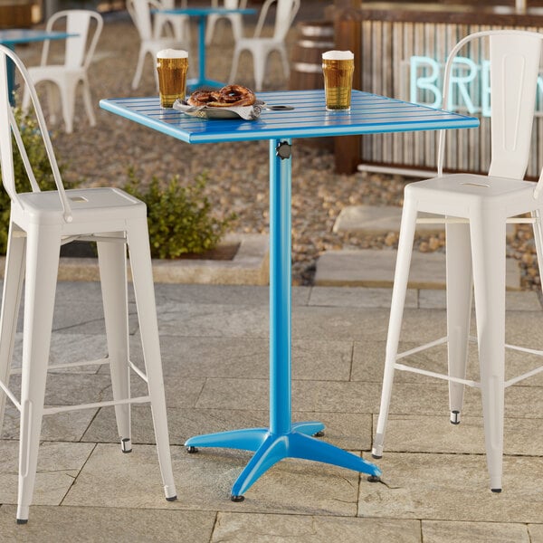 Lancaster Table & Seating 32" x 32" Blue Powder-Coated Aluminum Bar Height Outdoor Table with Umbrella Hole