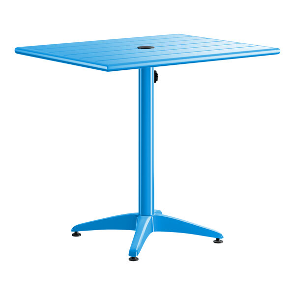 A blue powder-coated aluminum outdoor dining table with a square top, central pedestal base, and an umbrella hole.