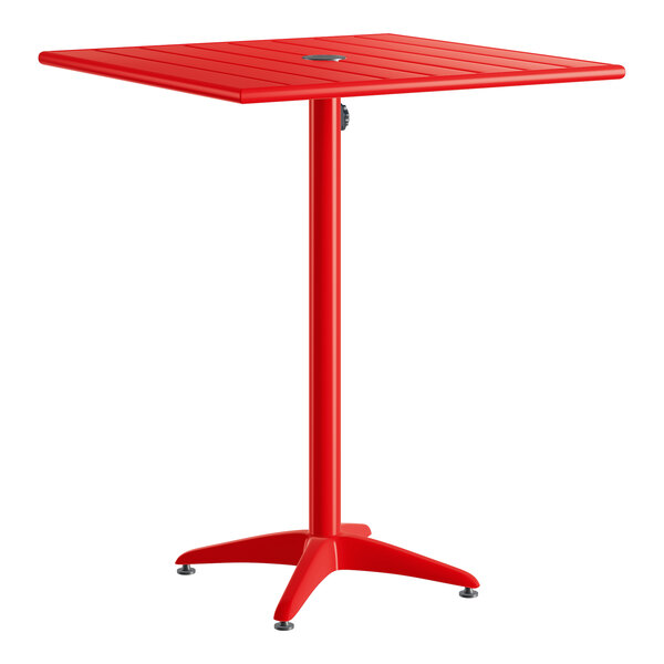 A red powder-coated aluminum bar height outdoor table with a square top and umbrella hole.