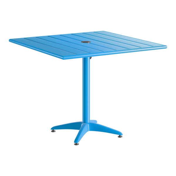 A blue square aluminum outdoor dining table with an umbrella hole in the center.