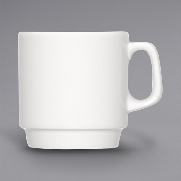 A Bauscher bright white porcelain cup with a handle.