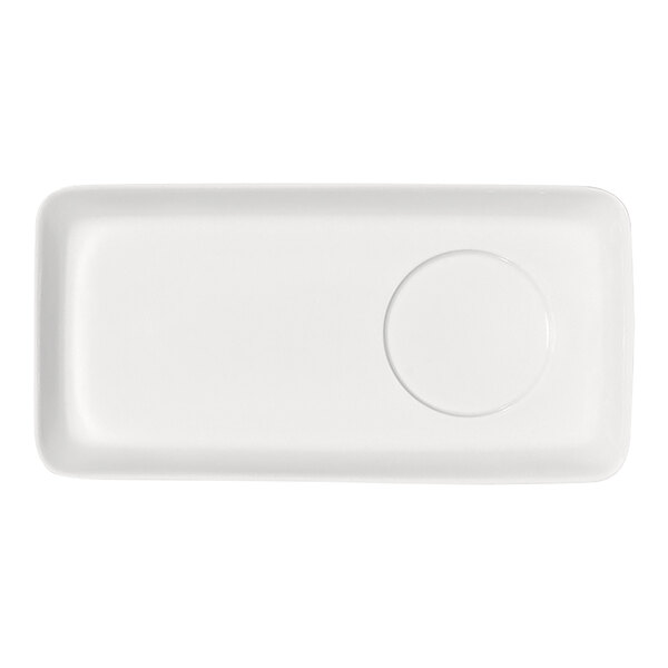 A rectangular white platter with a raised rim and a circular indentation on one side.