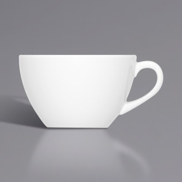 A Bauscher bright white porcelain cup with a handle.