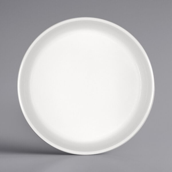 a white plate on a gray background