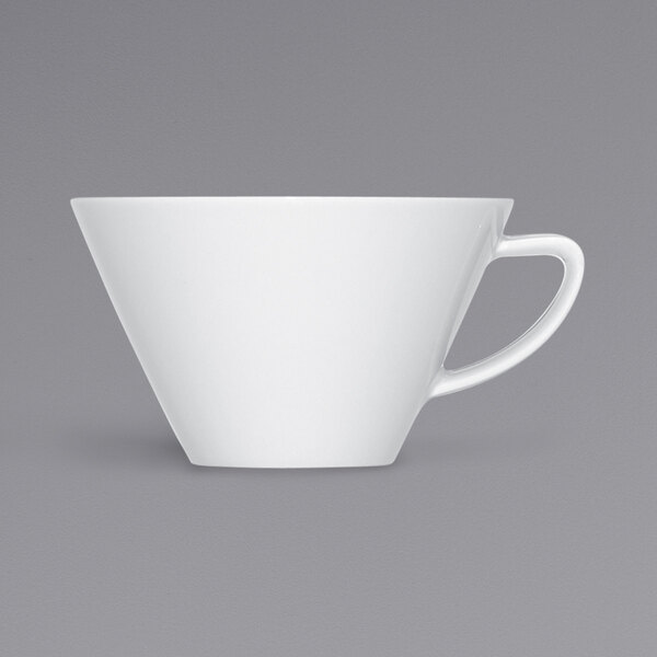 A close-up of a white Bauscher cup with a handle.