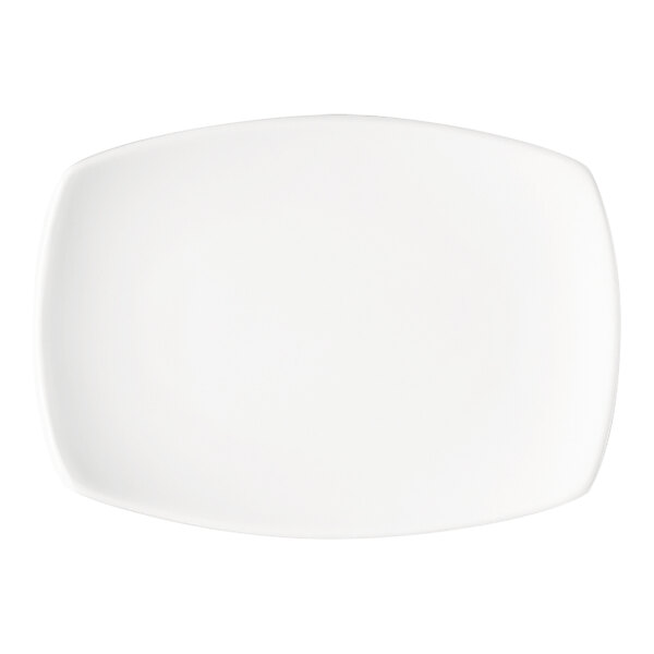 A plain, bright white, rectangular porcelain platter with slightly curved edges.
