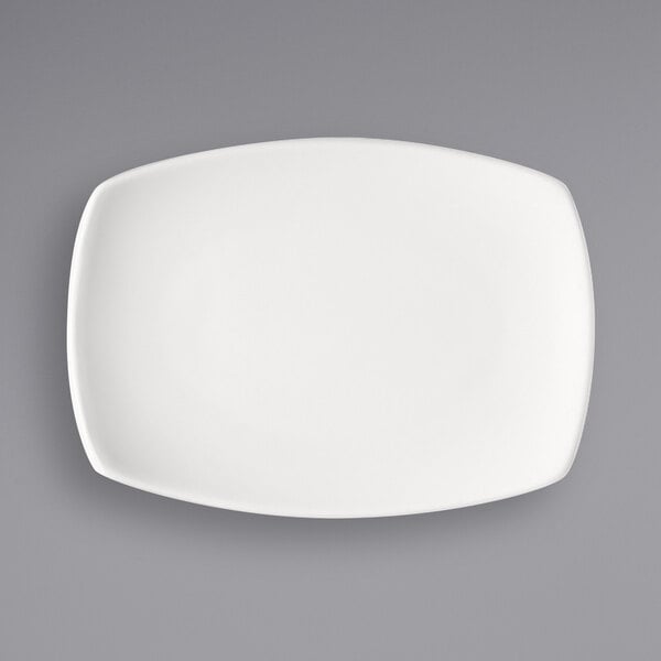 A Bauscher bright white rectangular porcelain coupe platter on a white background.