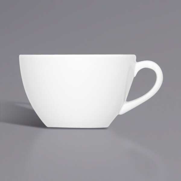 A Bauscher bright white porcelain cup with a handle.