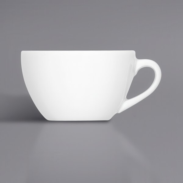 A Bauscher bright white porcelain cup with a handle.