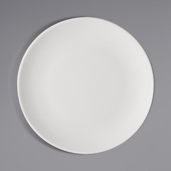 a white plate with a black and white circle