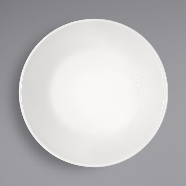 A Bauscher bright white porcelain bowl with a white rim.