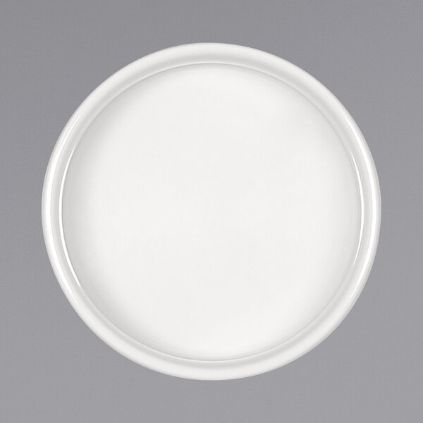a white plate on a gray background