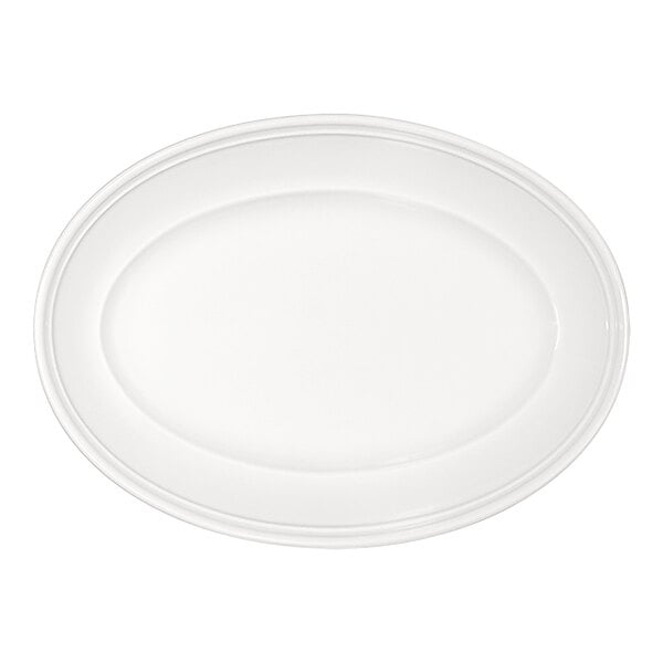 A plain, bright white oval platter with a wide rim, viewed from above.