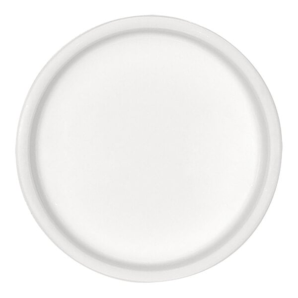 A round, plain white dish with a slightly raised rim, viewed from above.