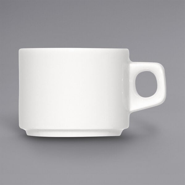 A Bauscher bright white porcelain cup with a handle.