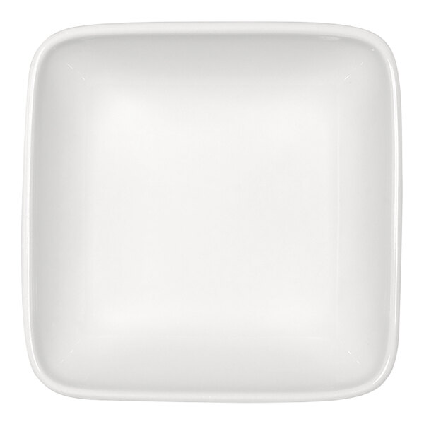 A square, bright white porcelain dish with slightly rounded edges.