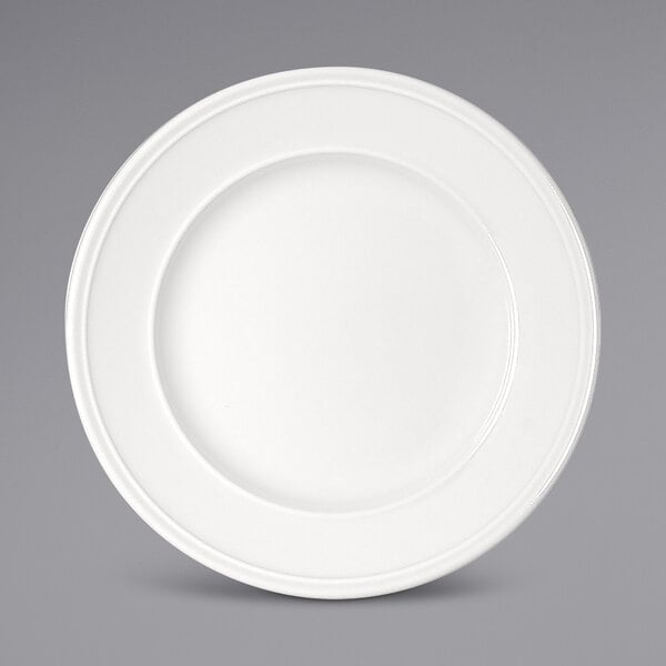 A Bauscher bright white porcelain plate with a wide rim.