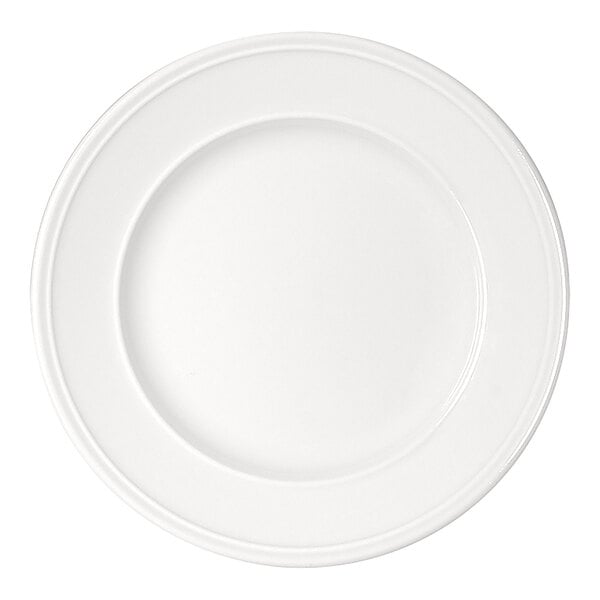 A plain, round, white plate with a wide rim and a smooth surface.