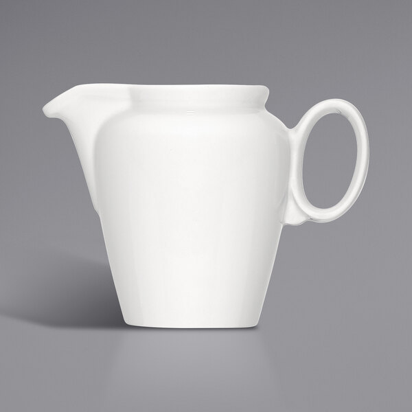 a close-up of a white vase