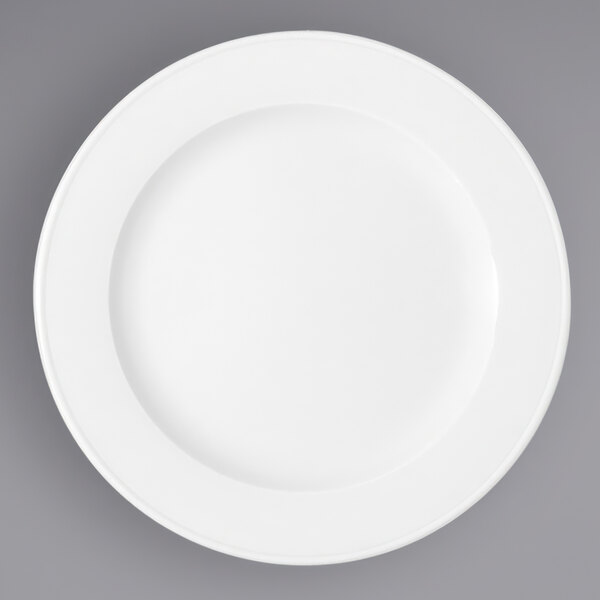 A Bauscher bright white porcelain plate with a wide rim.
