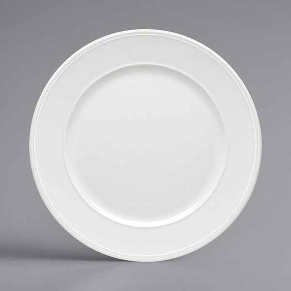 A Bauscher bright white porcelain plate with a wide round edge.