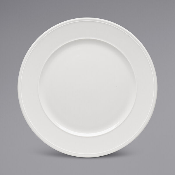 A Bauscher bright white porcelain plate with a wide round edge.