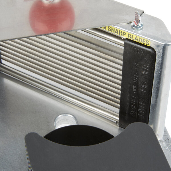 A metal Vollrath straight blade assembly with a red ball.